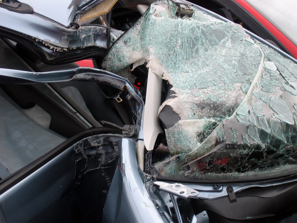 An image of a car that has been damaged in a crash. - Olympia Car Accident Lawyers